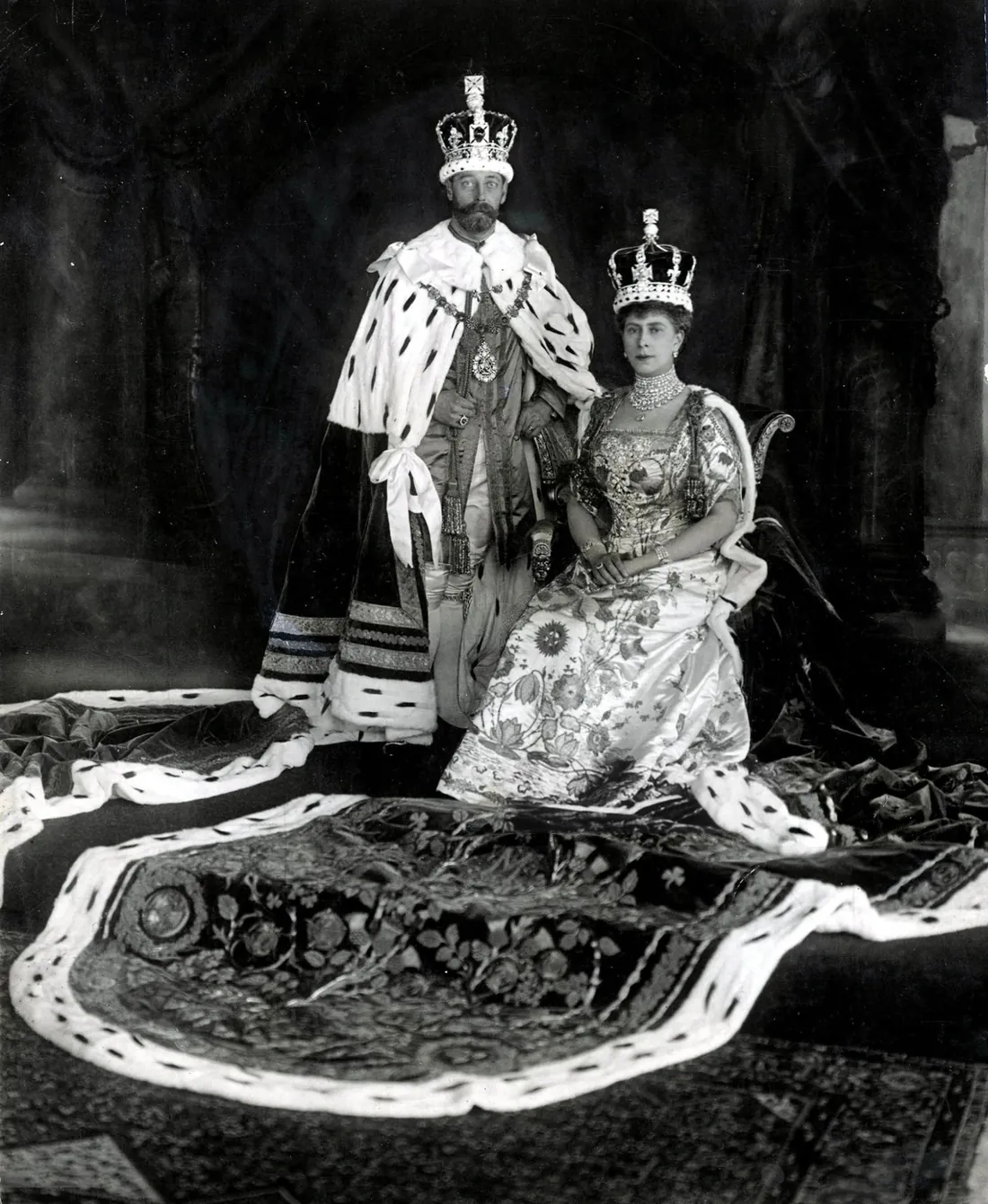 King George V and Queen Mary in ceremonial robes, shown as historical context